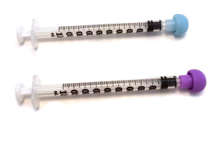 syringe with cap